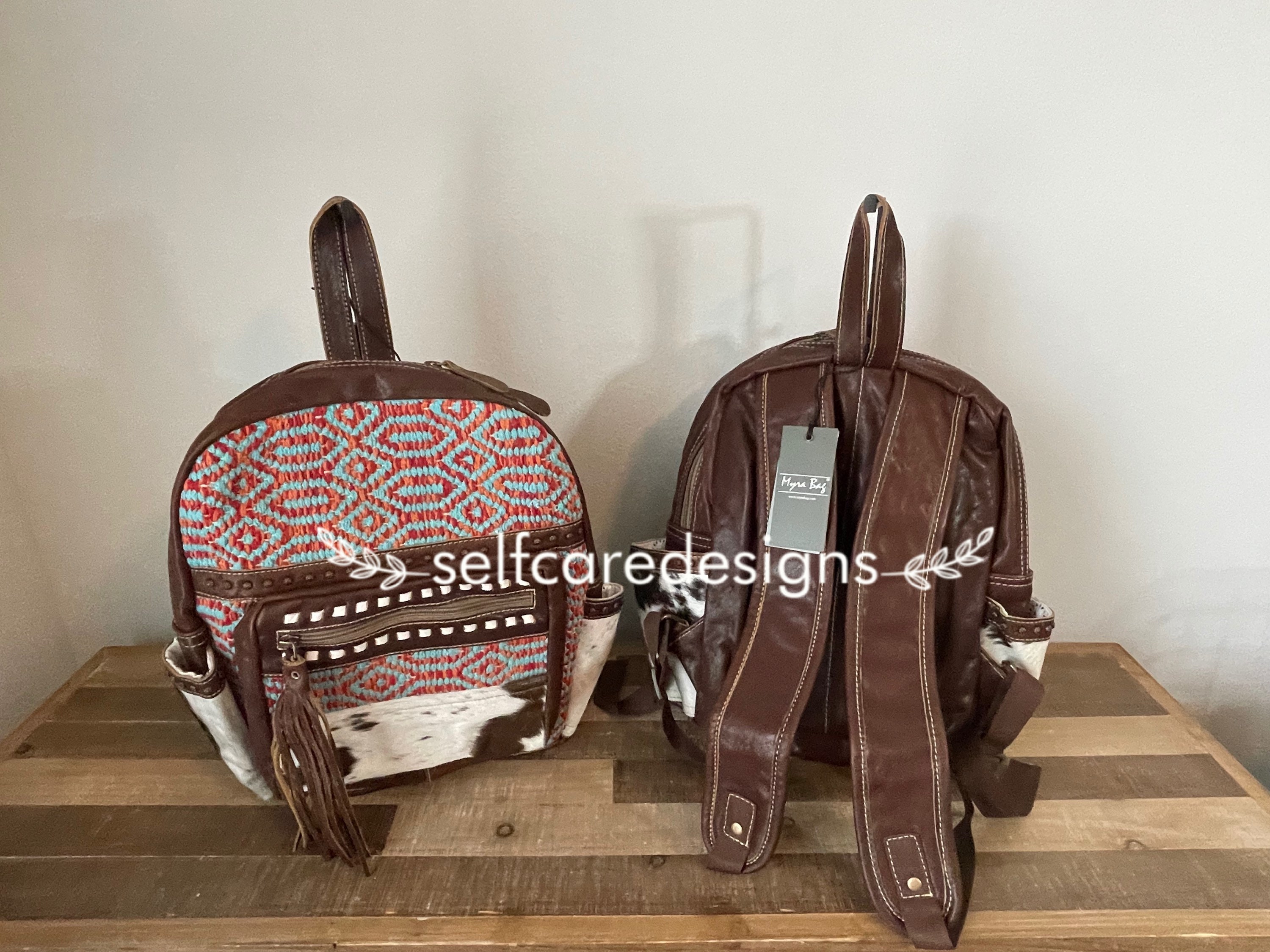 cowhide backpack purse