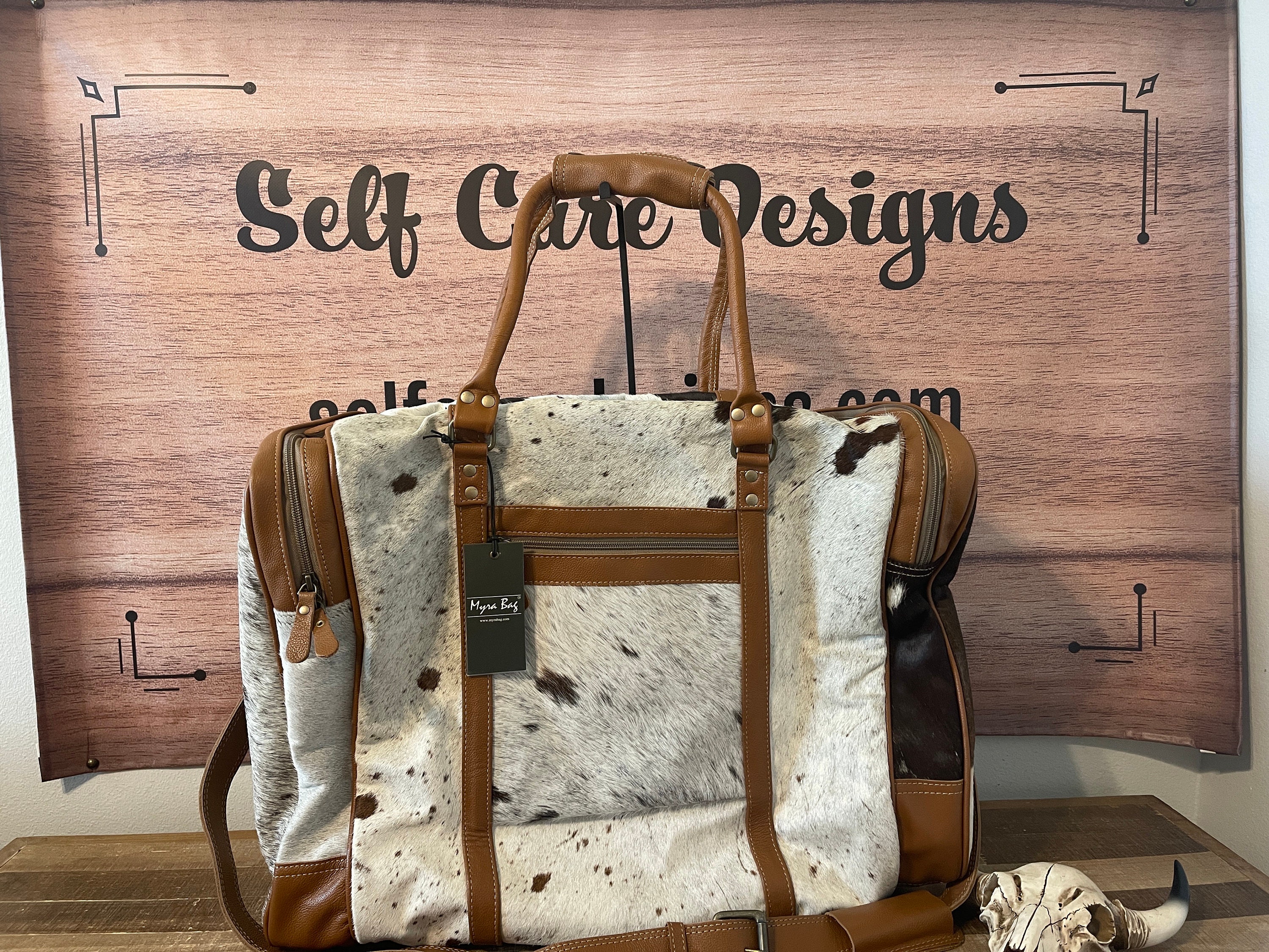 Wholesale Cowhide Travel Overnight Weekender Myra Bag for your