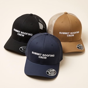 May include: Three baseball caps in black, navy blue, and tan, each featuring a mesh back and the white embroidered text SUMMIT ROOFING CREW on the front. Each cap includes a circular black and white sticker on the brim labelled 110 Flexfit Tech.