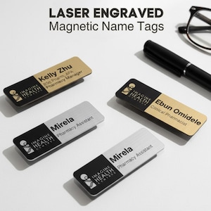 May include: Four laser-engraved magnetic name tags. Two tags are gold and black, and two are silver and black. The tags display names, titles, and the "Imagine Health Center" logo. The text "LASER ENGRAVED Magnetic Name Tags" is at the top.