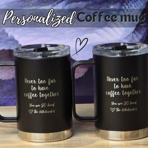 Personalized black coffee mugs with Never too far to have coffee together and You are so loved engraving. Metal base, clear lid. Perfect gift for couples.
