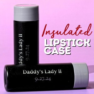 May include: Two black insulated lipstick cases with silver lids. The cases are engraved with the text "Daddy's Lady II" and the date "9.27.24".