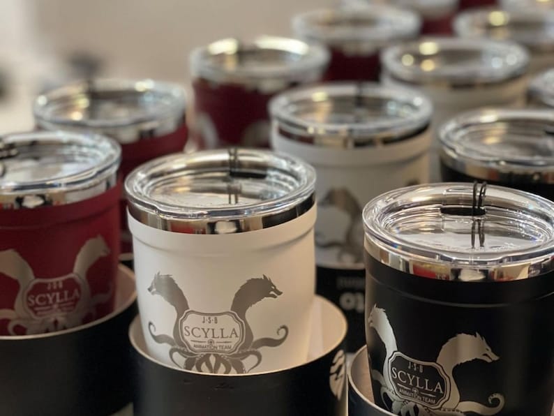Scylla Animation Team custom tumblers. Insulated stainless steel travel mugs in red, white, and black. Perfect for hot or cold drinks. Show your team pride!