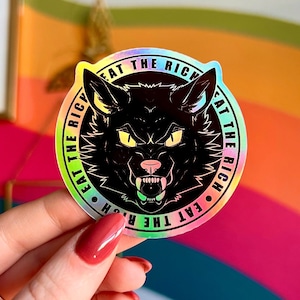 EAT THE RICH holographic wolf sticker