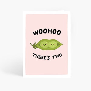 May include: A pink card with a green pea pod with two smiling peas inside. The text "WOOHOO THERE'S TWO" is written in black.