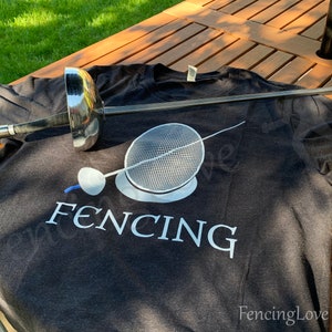 Premium Fencing T-Shirt. Unisex Jersey Tee with Fencing Mask and Sword for Fencers - Man and Woman. Great Birthday Gift for Athlete or Coach