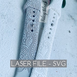 May include: Two white silicone watch bands with a detailed, intricate, laser-cut design. The bands are for Apple Watches and have the text "Riley Black" on one of the bands.  LASER FILE - SVG