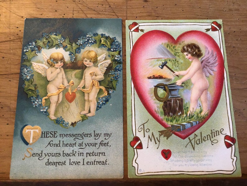 8 Antique valentine postcards..1909-1910..4 not used..embossed ..good condition