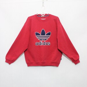 red adidas sweatshirt