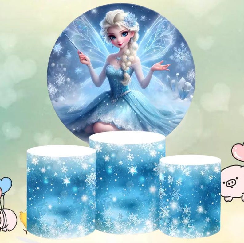 May include: Three round cake stands with a blue and white snowflake pattern. The top stand features a circular image of a fairy with blue wings and a blue dress. The fairy is holding a wand and has blonde hair.