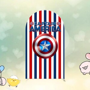 May include: A Captain America themed arch-shaped backdrop with red, white, and blue vertical stripes. The shield logo is centered, and the text "CAPTAIN AMERICA" is displayed above it. The backdrop is likely for a party or event.