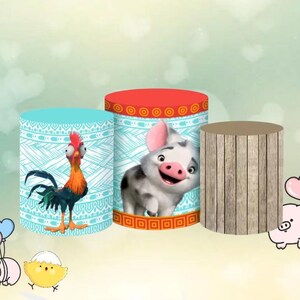May include: Three cylindrical display stands. One features a rooster cartoon, another a pig cartoon, and the third has a wood grain pattern. The stands have red, blue, and brown tops and are decorated with cartoon characters.