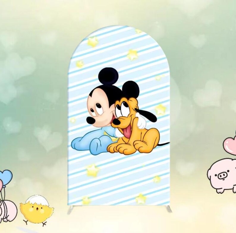 May include: A blue and white striped backdrop with yellow stars and a cartoon image of Mickey Mouse and Pluto. Mickey Mouse is wearing a blue onesie and Pluto is wearing a yellow and brown outfit.
