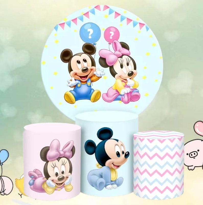 May include: A set of three ceramic mugs with a speckled, cream-coloured glaze. Each mug features a different hand-painted design: a blue and green leaf, a yellow flower, and a red berry. The mugs have a simple, modern design.