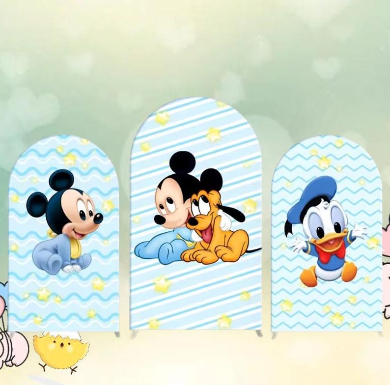 May include: Three blue and white arch-shaped cardboard backdrops with a blue and white striped pattern and yellow stars. The backdrops feature cartoon characters Mickey Mouse, Pluto, and Donald Duck.