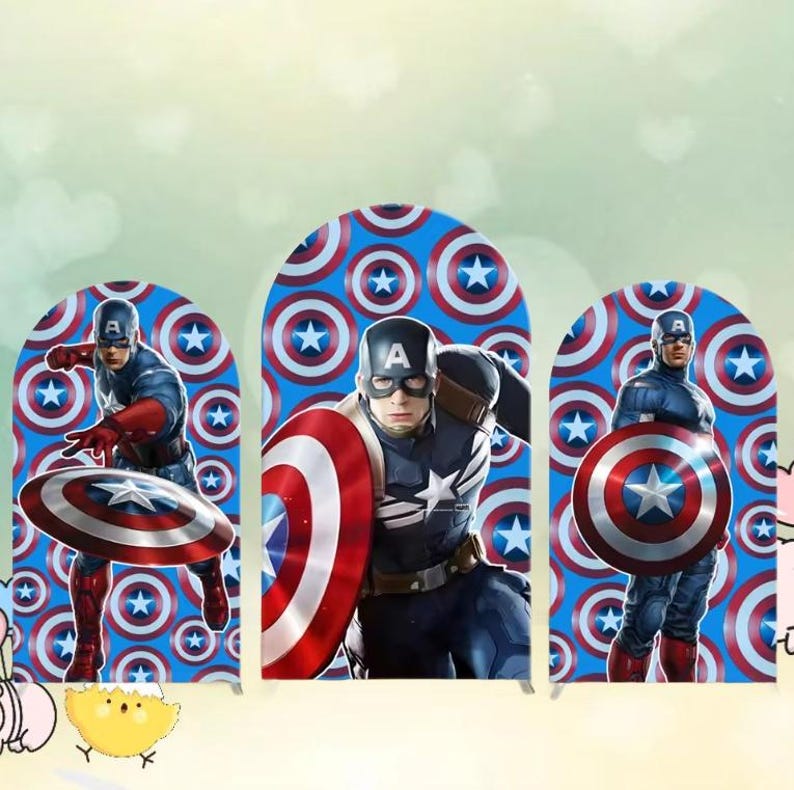 May include: Three Captain America cutouts. Each cutout features Captain America in a blue and red costume, holding his shield. The background is a blue pattern with white stars and red circles. The cutouts are in an arch shape.