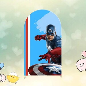 May include: A blue and red Captain America arch-shaped backdrop featuring the superhero in action, holding his shield. The backdrop has a blue background with white and red stripes on the left side.