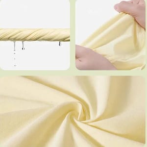 May include: A close-up of a yellow fabric being wrung out, with water droplets falling. The fabric is also shown being held and twisted, and in a close-up of the soft texture. The fabric appears to be absorbent.