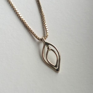 Vulva pendant