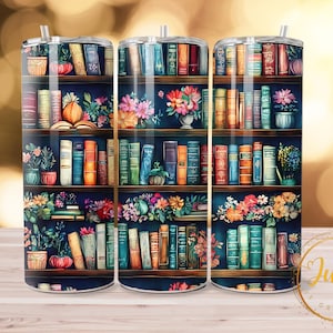 May include: A set of three stainless steel tumblers with a colorful design of a bookshelf filled with books and flowers. The tumblers are perfect for holding hot or cold beverages.