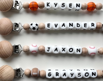 Custom Sports Pacifier Clip with Name – Personalized Baby Shower Gift  – Football / Soccer / Baseball / Basketball Soother Holder