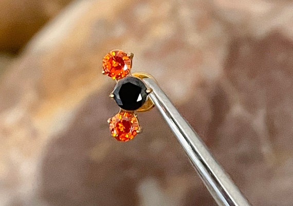 ASTM F136 Titanium Orange & Black Triple Cubic Zirconia Gem Prong