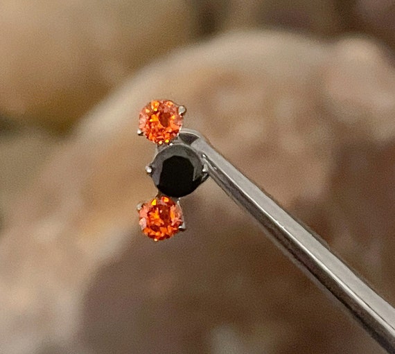 ASTM F136 Titanium Orange & Black Triple Cubic Zirconia Gem