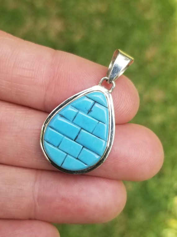 Details about Sterling Silver Teardrop Shaped Pendant W Chip Turquoise & Coral Inlay Details about Sterling Silver Teardrop Shaped Pendant W Chip Turquoise & Coral Inlay