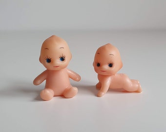 Set Of Two Mini Kewpies Sitting And Crawling