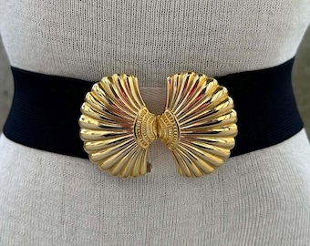 1980s black elastic belt gold tone seashell buckle, glam mermaid stretch waistband, under the sea gala, maximalist style, sophisticated lady