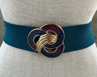 80s vtg Day Lor teal elastic belt, blue teal purple and gold swirl enamel buckle, modern trinity knot marbled buckle, sophisticated fashion