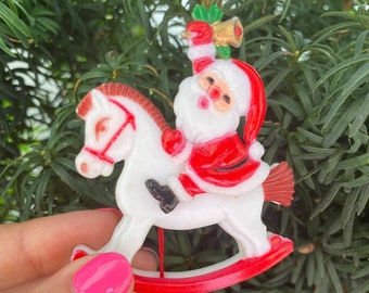 Vintage santa claus brooch, papa noel on rocking horse, plastic santa claus pin, christmas brooch collector, christmas lovers gift, navidad