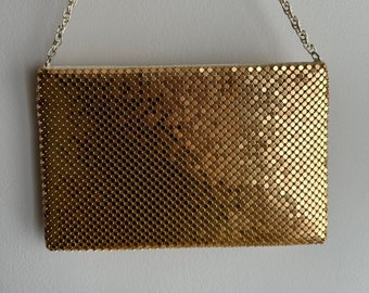 Y2K Paco Rabanne golden metal mesh clutch, gold tone mesh shoulder bag, lady million, maximalist disco fashion, iconic glam statement bag