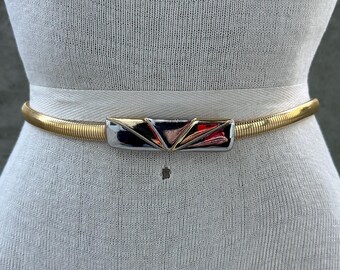 70s Accessocratf NYC belt, gold tone elastic serpentine belt, silver and gold art deco style rectangular buckle, iconic statement accessory