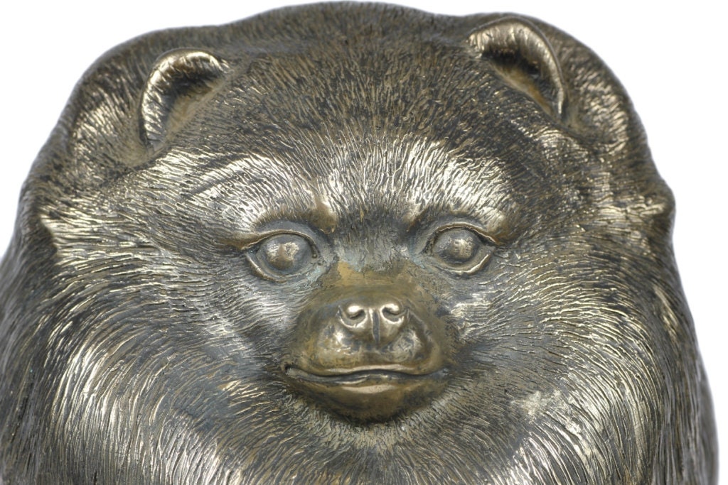pomeranian statue with wings