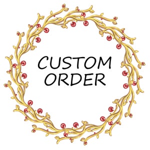 May include: A circular design featuring the words "CUSTOM ORDER" in black, surrounded by a golden, vine-like wreath adorned with red, spherical accents. The design is set against a white background.