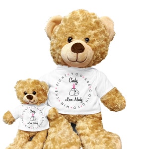 May include: Two brown teddy bears wearing white t-shirts with a pink ribbon and boxing gloves graphic. The text on the shirts reads "You are going to win the fight Cindy Love Mindy".