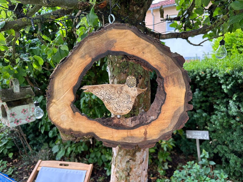 Large wind chime made of walnut wood, hollow large tree disc with hand-made ceramic bird image 1