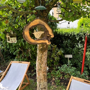 Large wind chime made of walnut wood, hollow large tree disc with hand-made ceramic bird image 4