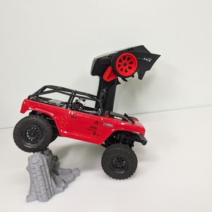 3D Printed Thumb Steering Wheel that fits SCX24 AX-4 Radio