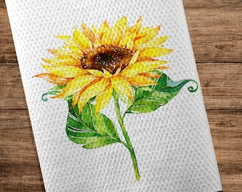 May include: A watercolor painting of a sunflower with yellow petals and a brown center. The sunflower is on a white background with a textured surface.