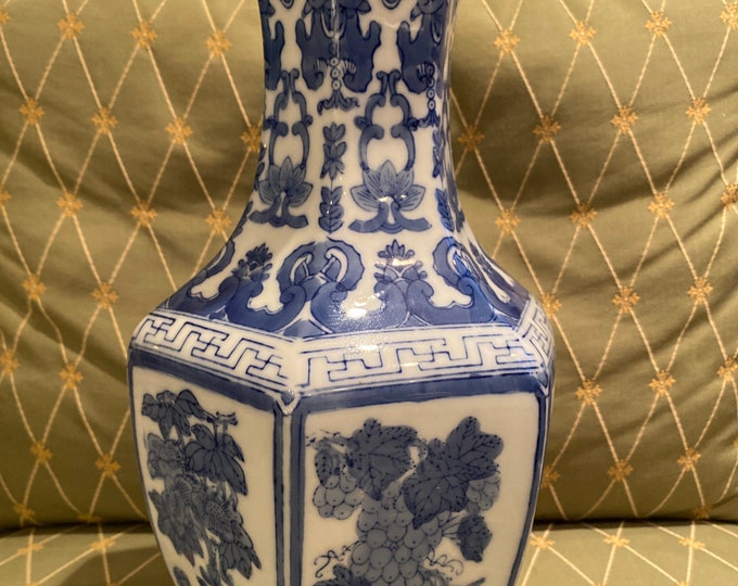 Tall blue and white vase