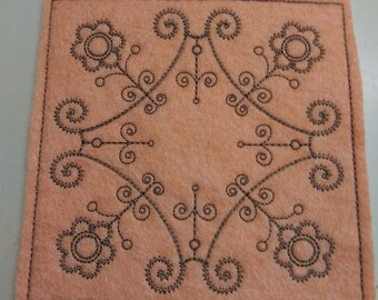 Felt coasters. Embroidered felted merino wool coasters.