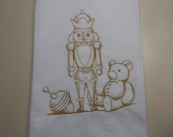 Nutcracker towel. Nutcracker, top and teddy bear embroidered flour sack towel