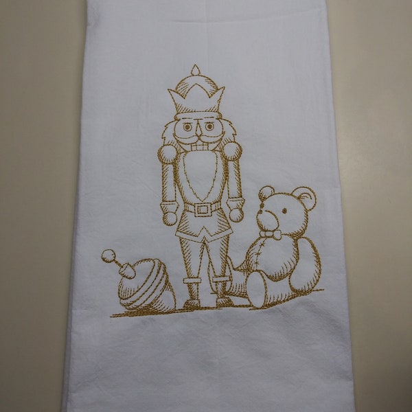Nutcracker towel. Nutcracker, top and teddy bear embroidered flour sack towel