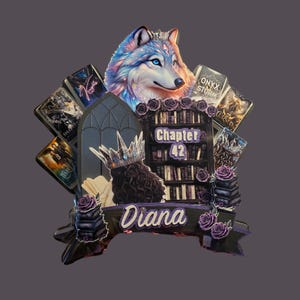 May include: A purple and black book-themed decorative piece with a wolf, a crown, a bookshelf, and the text "Chapter 42" and "Diana".
