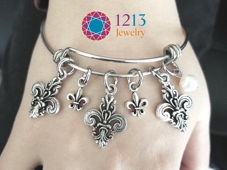 Fleur De Lis Charm Bracelet Handmade Your Choice Of A Semiprecious Stone Or Pearl Accent On An Expandable Stainless Steel Bangle image 1