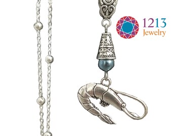 Shrimp Handmade Necklace on a Sterling Silver Chain with a Muted Blue Glass Round Accent