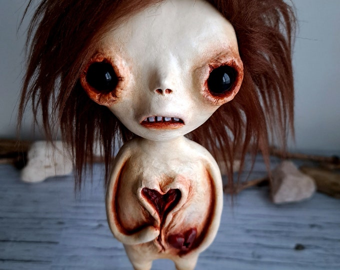 Creepy Decor, Weird Sculpture, Creepy Doll Statue, Weird Art, Weird Stuff, Valentines Day Statue, Dark Art Sculpture, Bleeding Heart Figure