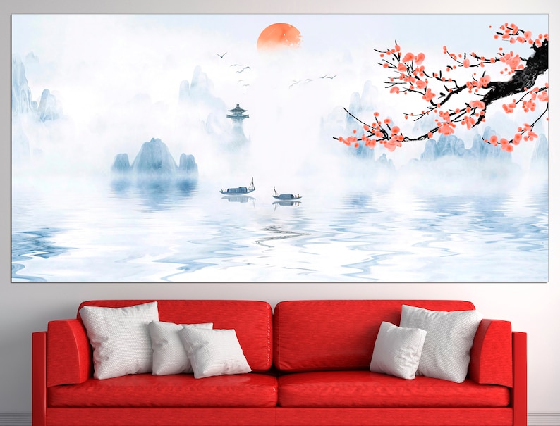 May include: A watercolor painting of a misty mountain landscape with a red sun in the sky. The mountains are reflected in the water, and there are two small boats on the water. A branch of pink blossoms hangs over the scene.